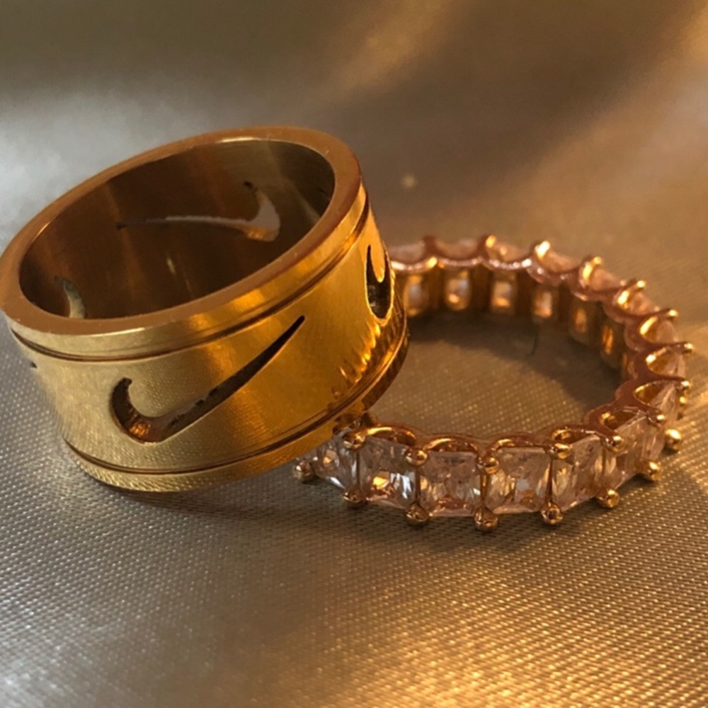 NIKE SWOOSH RING IN GOLD